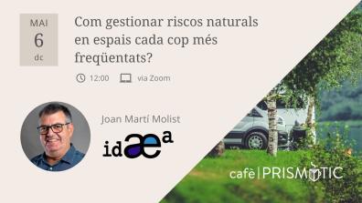 Man smiling, text, logo, and a partial view of nature with a van.