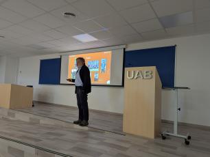 Man giving a presentation in a conference room.