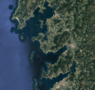 Aerial photograph of a coastline with inlets and islands.